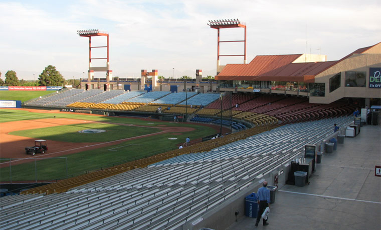 Colorful seats and silver bleachers fill Cashman Field's grandstand