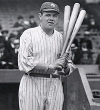Babe Ruth with three bats photo