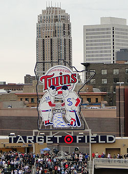 The Minnie and Paul celebration sign and Minneapolis skyline