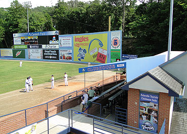 Right field fence, scoreboard and backdrop at McCormick Field
