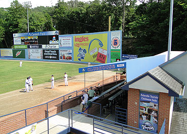 Right field fence, scoreboard and backdrop at McCormick Field