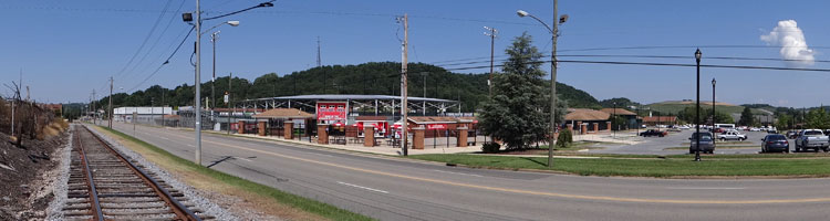 Johnson City's Cardinal Park seen between its parking lot and a railroad track