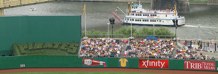 A riverboat passing by PNC Park on the Allegheny River