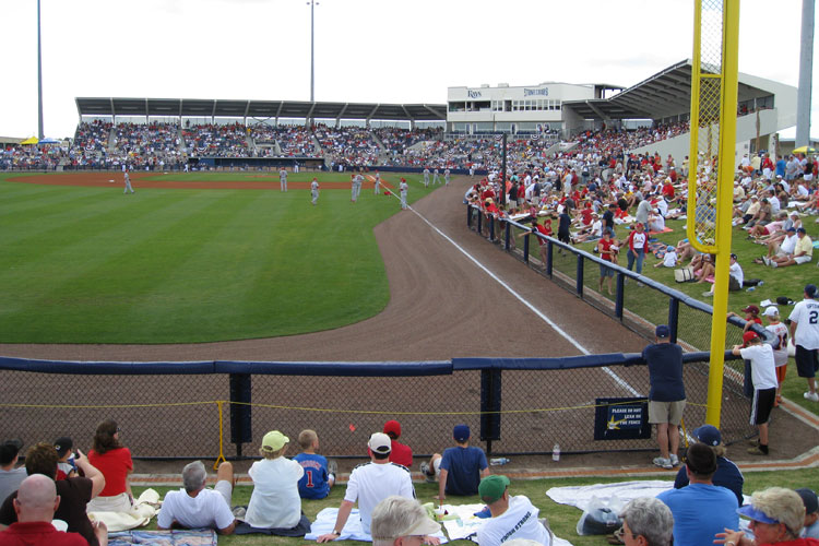 The third baseline berm wraps around the left field foul pole